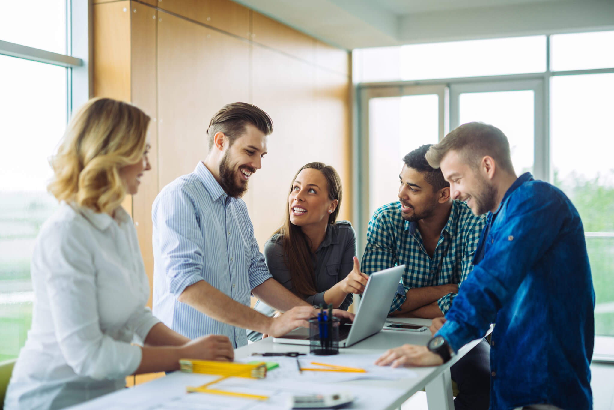 Group of business colleagues working in a boardroom meeting.