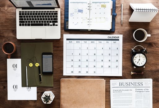 desk with calendar and documents.