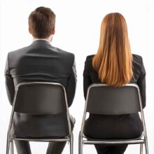 A photo of a male and a female candidate waiting for interview
