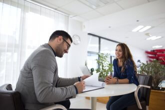 An interviewer putting a candidate through a CCAT test.