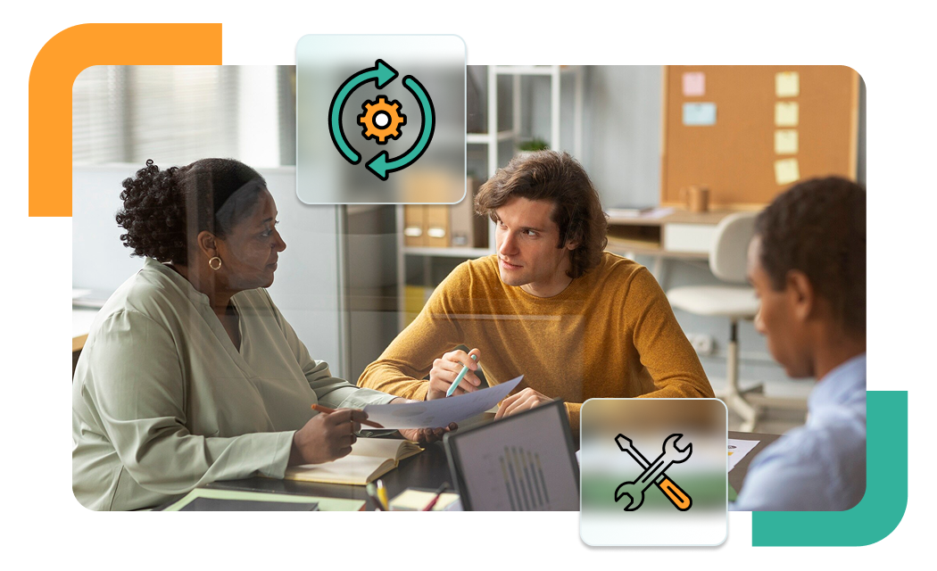 Three professionals in a meeting reviewing documents and data, symbolizing collaboration and job skill evaluation.
