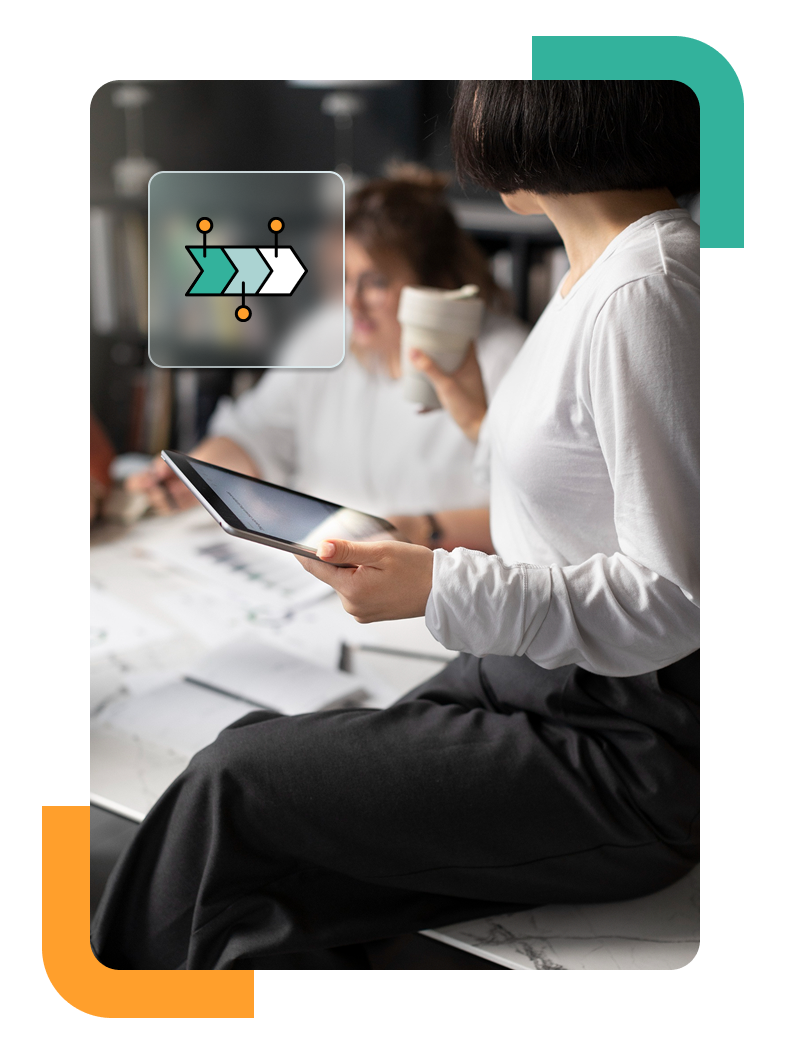 Woman holding a tablet and coffee cup during a team discussion, with an icon representing process or workflow steps.
