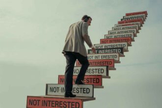 Rejections transforming into steps, symbolizing resilience and success in cold calling.