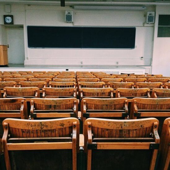 a classroom of empty chairs