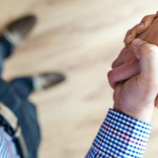 Aerial view of men shaking hands.