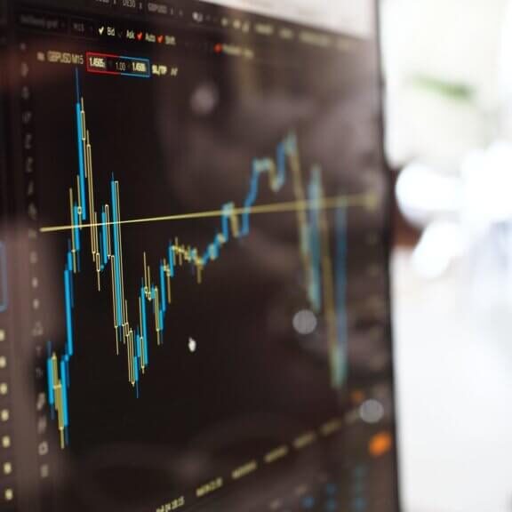 Picture of screen that monitors rise and fall of stocks
