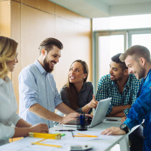 Group of business colleagues working in a boardroom meeting.