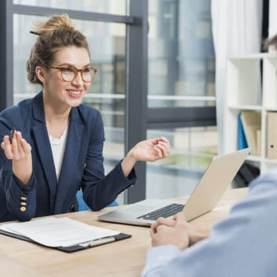 A female manager doing a performance management evaluation.